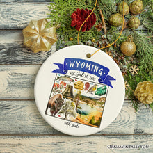 Load image into Gallery viewer, Artistic Wyoming State Themes and Landmarks Christmas Ornament