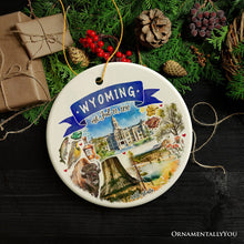 Load image into Gallery viewer, Artistic Wyoming State Themes and Landmarks Christmas Ornament