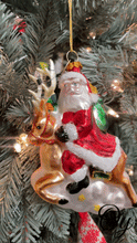 Load image into Gallery viewer, Santa Riding Reindeer Glass Christmas Ornament