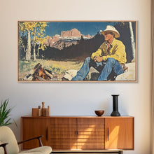 Load image into Gallery viewer, Bold monochromatic Framed Canvas Print showcasing a woman in a cowboy hat with horses in a snowy mountain landscape, rustic winter wall art