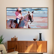 Load image into Gallery viewer, Cowgirl in Pink Shirt Riding Horse by the Sea, Beautiful Framed Canvas Print, Coastal Living Room Art, Beach Bedroom Decor, Horse Art