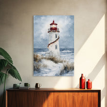 Carregar imagem no visualizador da galeria, Snowy lighthouse wrapped with festive garland, Framed Canvas Print, beach Christmas decor, holiday wall art perfect for coastal homes