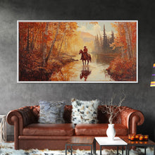 Load image into Gallery viewer, Black white cowboy riding toward snow-covered mountains, Framed Canvas Print, minimalist winter wall art, moody landscape, western decor