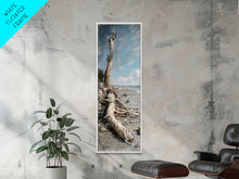 Carregar imagem no visualizador da galeria, Framed Canvas Print Skinny Art of a Weathered Driftwood Tree Trunk on a Sandy Shore with a Calm Ocean Backdrop, Ideal Tall Art for Coastal Decor