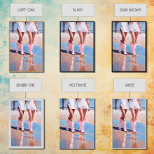 Load image into Gallery viewer, Cowgirls walking on the beach wearing pink cowboy boots, artistic reflection Framed Canvas Print - beach fashion, summer decor, vibrant art