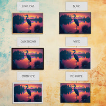 Carregar imagem no visualizador da galeria, A stork standing in a calm lake at sunset, framed canvas print