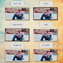 Carregar imagem no visualizador da galeria, Fall harvest Framed Canvas Print featuring a cowgirl sitting among pumpkins in a rustic setting, farmhouse autumn decor and wall art