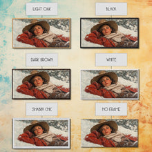 Load image into Gallery viewer, Cowgirl Laying In The Snow Framed Canvas Print, Cute Rustic Decor, Cowgirl Portrait Painting, Winter Wall Art