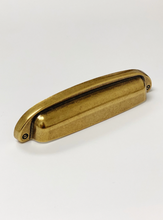 Load image into Gallery viewer, Drawer Cup Pull "Capri" in Antique Brass - Brass Cabinet Hardware