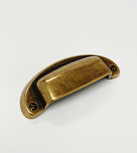 Load image into Gallery viewer, Drawer Cup Pull "Capri" in Antique Brass - Brass Cabinet Hardware
