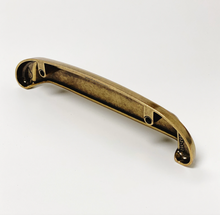 Load image into Gallery viewer, Drawer Cup Pull "Capri" in Antique Brass - Brass Cabinet Hardware