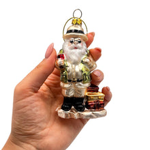 Carregar imagem no visualizador da galeria, Adventurous Safari Santa Handblown Glass Ornament, African Jungle Explorer Travel Themed Christmas Decor
