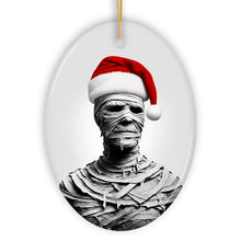 Carregar imagem no visualizador da galeria, Ghoulish Mummy with Santa Hat Ornament, Sinister Holiday Keepsake for Halloween Lovers