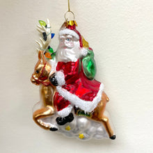 Load image into Gallery viewer, Santa Riding Reindeer Glass Christmas Ornament