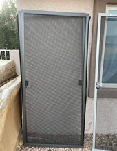 Load image into Gallery viewer, Ritescreen Adjustable Patio Screen Door&#39; Bronze&#39; 36X78 DELIVERY LAS VEGAS ONLY
