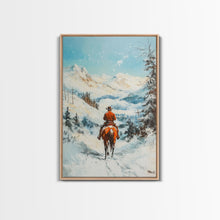 Load image into Gallery viewer, Cowboy Riding Through Snowy Mountains Framed Canvas Print Christmas Wall Art Winter Wonderland Decor Seasonal Wall Art Christmas Gift Idea
