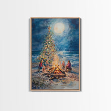 Cargar imagen en el visor de la galería, Christmas by the Bonfire Framed Canvas Print Family Gathering Around Christmas Tree Beach, Coastal Holiday Wall Art Nautical Christmas Decor
