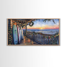 Carregar imagem no visualizador da galeria, Beachfront porch with surfboards and Christmas lights, Framed Canvas Print with wreaths festive lights, coastal holiday wall art and decor
