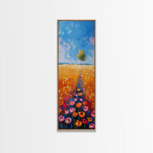 Load image into Gallery viewer, Colorful Wildflowers in a Field with a Lone Tree Under a Bright Blue Sky on a Framed Canvas Print Tall Art Piece
