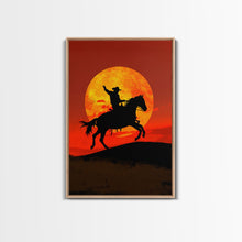 Load image into Gallery viewer, Cowboy Silhouette on Horseback at Sunset | Framed Canvas Print | Western Landscape Art | Rustic Cowboy Wall Art for Living Room
