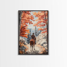 Load image into Gallery viewer, Cowboy riding through autumn forest, Framed Canvas Print, fall landscape wall art, western style decor for cozy homes, perfect gift idea
