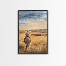 Load image into Gallery viewer, Cowboy leading cattle across golden prairie, Framed Canvas Print, western landscape wall art for rustic farmhouse decor, gift idea holiday
