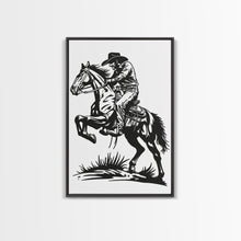 Load image into Gallery viewer, Cowboy Riding Horse with Reins - Framed Canvas Print, Western Wall Art, Rustic Decor, Living Room and Bedroom Art Print
