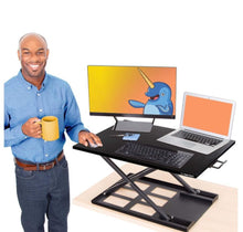 Load image into Gallery viewer, Stand Steady X-Elite Pro Standing Desk Converter | Instantly Convert Any Desk into a Stand Up Desk | Easy Lift Height Adjustable Standing Desk | No As
