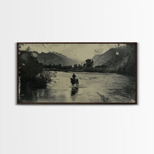 Load image into Gallery viewer, Cowboy Crossing River with Mountains, Framed Canvas Print for Western Living Room Decor, Ideal Bedroom Wall Art, Rustic Scene
