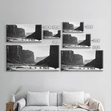 Load image into Gallery viewer, Framed Canvas Print of Cowboys Riding through Canyon, Western Wall Art for Living Room or Bedroom, Unique Home Decor
