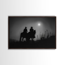 Load image into Gallery viewer, Cowboys Under A Full Moon, Framed Canvas Print, Black and White Western Photography, Wild West Art, Western Decor, Farmhouse Country Art
