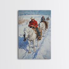Load image into Gallery viewer, Cowboy Riding Horses in Snow Canvas Print, Winter Wall Art, Rustic Christmas Decor, Holiday Gift Idea, Seasonal Art, Framed Canvas Print
