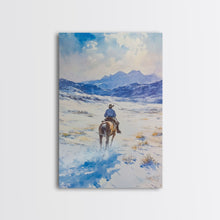 Load image into Gallery viewer, Cowboy riding through snowy mountain pass, Framed Canvas Print, western winter landscape wall art, farmhouse holiday decor Christmas gift
