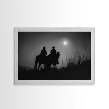 Load image into Gallery viewer, Cowboys Under A Full Moon, Framed Canvas Print, Black and White Western Photography, Wild West Art, Western Decor, Farmhouse Country Art
