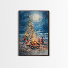 Cargar imagen en el visor de la galería, Christmas by the Bonfire Framed Canvas Print Family Gathering Around Christmas Tree Beach, Coastal Holiday Wall Art Nautical Christmas Decor
