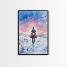 Load image into Gallery viewer, Cowboy riding through snowy sunset, Framed Canvas Print, winter landscape wall art, western decor for above sofa, rustic holiday decor
