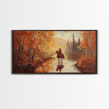 Load image into Gallery viewer, Black white cowboy riding toward snow-covered mountains, Framed Canvas Print, minimalist winter wall art, moody landscape, western decor
