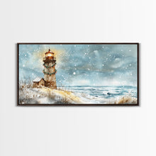 Load image into Gallery viewer, Coastal Christmas Lighthouse Decor Framed Canvas Print, Snowy Beach Scene with Holiday Wreath and Lighthouse Winter Wall Art
