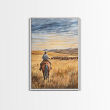 Load image into Gallery viewer, Cowboy leading cattle across golden prairie, Framed Canvas Print, western landscape wall art for rustic farmhouse decor, gift idea holiday
