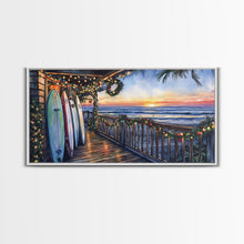 Carregar imagem no visualizador da galeria, Beachfront porch with surfboards and Christmas lights, Framed Canvas Print with wreaths festive lights, coastal holiday wall art and decor
