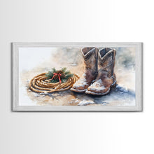 Load image into Gallery viewer, Framed Canvas Print Cowboy Boots and Rope with Pinecones, Rustic Winter Decor, Western Christmas Art, Perfect Holiday Wall Print
