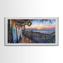 Carregar imagem no visualizador da galeria, Beachfront porch with surfboards and Christmas lights, Framed Canvas Print with wreaths festive lights, coastal holiday wall art and decor
