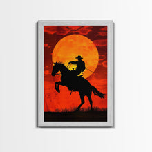 Load image into Gallery viewer, Cowboy Riding Horse into the Sunset | Framed Canvas Print | Western Silhouette Art | Rustic Cowboy Wall Art for Living Room
