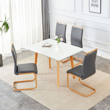Load image into Gallery viewer, White stone burning tabletop with rubber wooden legs, foldable computer desk, foldable office desk, Modern PU leather high back cushion side chair with wood grain metal legs.
