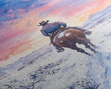 Load image into Gallery viewer, Cowboy riding through snowy sunset, Framed Canvas Print, winter landscape wall art, western decor for above sofa, rustic holiday decor
