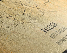 Load image into Gallery viewer, Panoramic Raleigh North Carolina map print poster or framed canvas, Raleigh map print poster canvas, city map Canvas print, Travel Art
