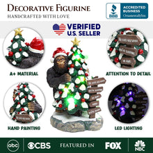Load image into Gallery viewer, Whimsical Bigfoot Behind Christmas Tree Figurine, 7.5&quot; Funny Holiday Yeti LED Statue, He Sees You When You&#39;re Sleeping
