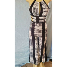 Load image into Gallery viewer, Mundefeis Black and White Tie back pantsuit
