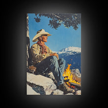 Load image into Gallery viewer, Cowboy Resting by the Fire Canvas Print, Winter Mountain Scene, Seasonal Wall Art, Rustic Western Decor, Holiday Gift, Framed Canvas Print

