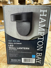 Cargar imagen en el visor de la galería, Hampton Bay 6.1 in. Black LED Outdoor Wall Lantern Sconce with Frosted Glass
